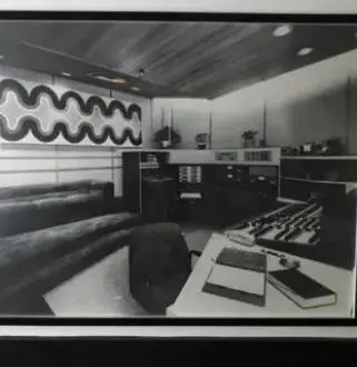 A black and white photo of an office space.